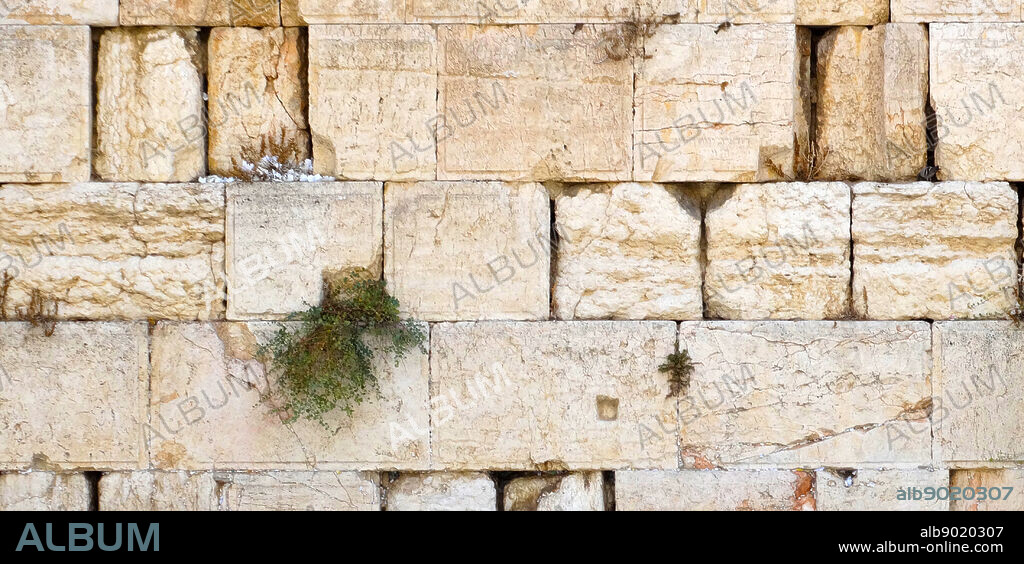 The Western Wall; Wailing Wall or Kotel; in the Old City of Jerusalem at the foot of the Western Side of the Temple Mount. Parts of the wall are remnants of the ancient wall that surrounded the Jewish Temple's courtyard and is arguably the most sacred site recognised by the Jewish faith outside of the Temple Mount itself.