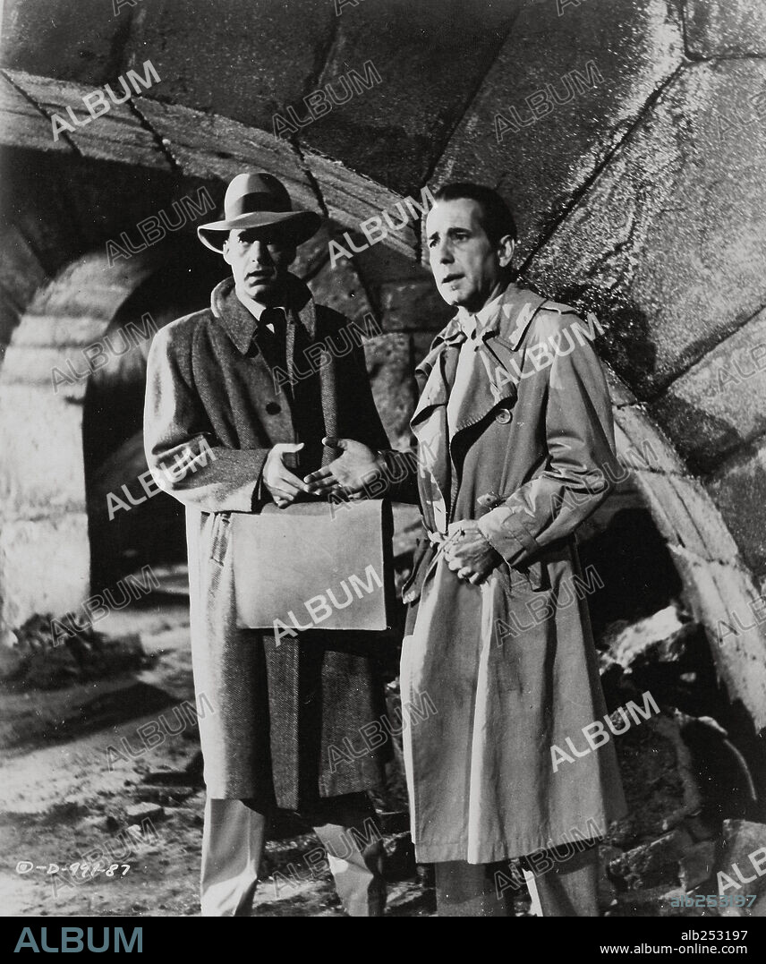 GERALD MOHR and HUMPHREY BOGART in SIROCCO, 1951, directed by CURTIS BERNHARDT. Copyright COLUMBIA PICTURES.