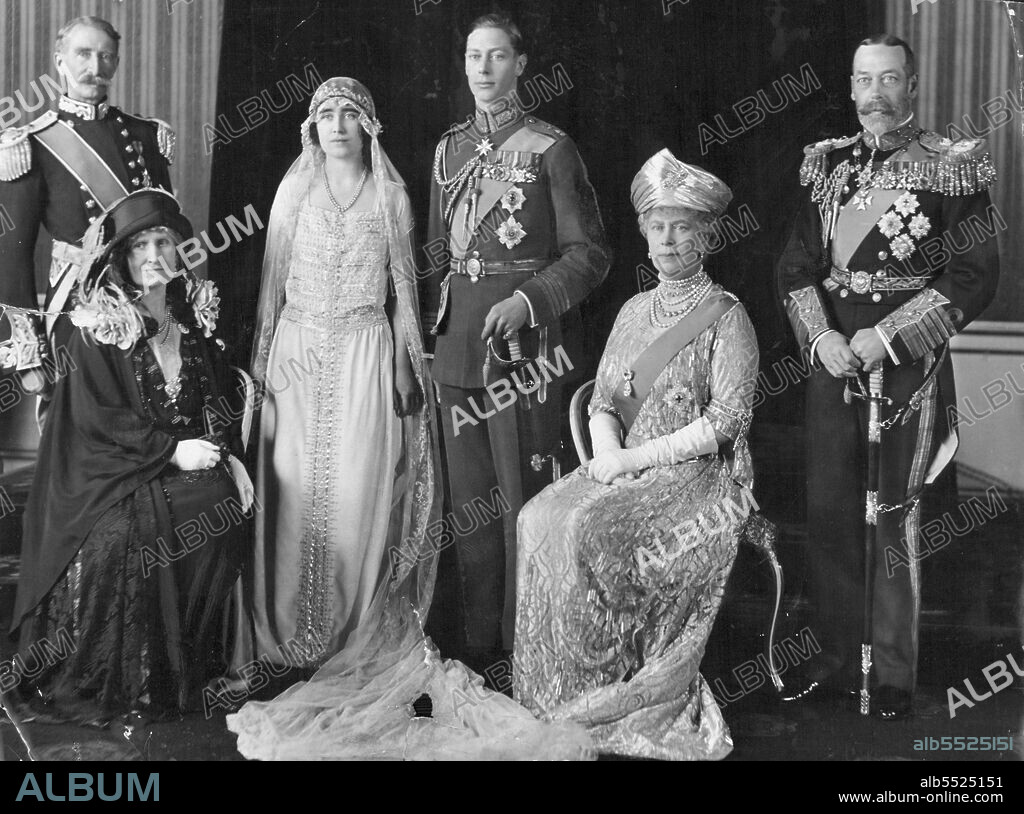 The Queen Mother, formerly Lady Elizabeth Bowes-Lyon, and the Duke of York - the future King George VI - at their wedding in 1923, seated is Queen Mary with King George V. January 04, 1937.