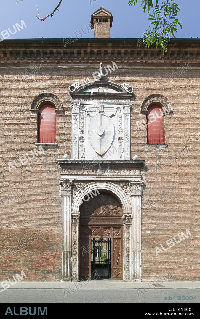 Ferrara, Palazzo Schifanoia (Este residence, or delizia) : the façade. View of the main entrance in Scandiana street. The façade is characterised by a big marble portal realised in 1470 by Ambrogio di Giacomo da Milano e Antonio di Gregorio on drawings by Pietro di Benvenuto degli Ordini. Above the arched white marble portal, there is a big emblem of the Estense family and the Unicorn, one of the araldic device by Borso.