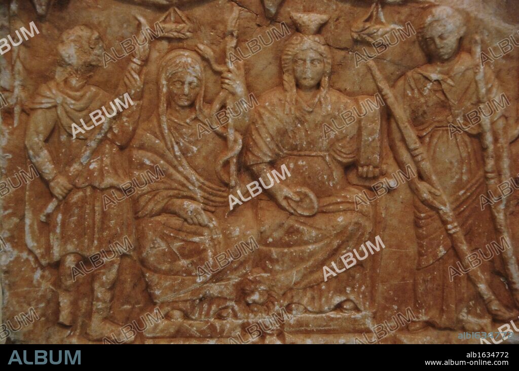 Taurobolium Altar (360-370) with relief depicting the goddess Cybele enthroned with Demeter (right) flanked by Persephone Kore and Iacchus. Probably from Chalandri. National Archaeological Museum. Athens. Greece.