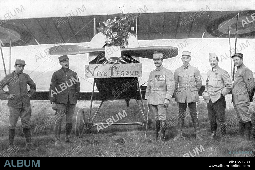 French Air ace Adolphe Pegoud, 4th from right, in front of his plane on the day when fellow officers presented him with a bouquet in celebration of his latest citation. Killed action 1915. First World War.