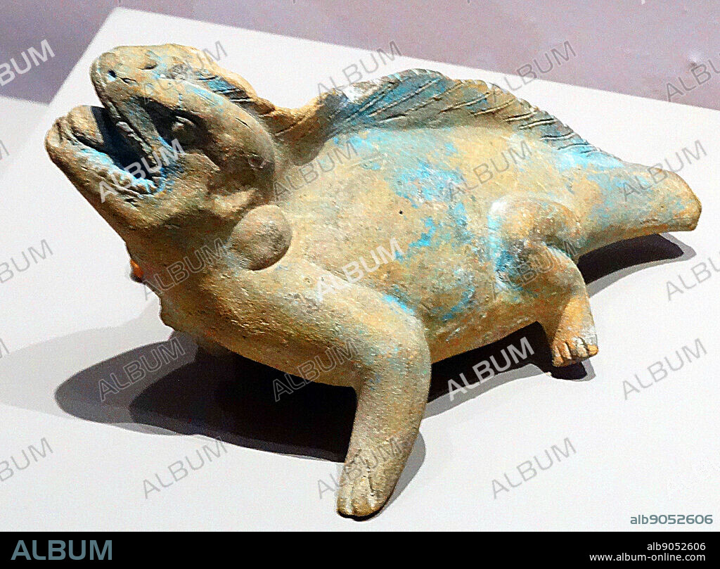 Zoomorphic figure-whistle. Unknown provenance. (600-900 AD) Ceramic. Whistle shaped as an iguana.