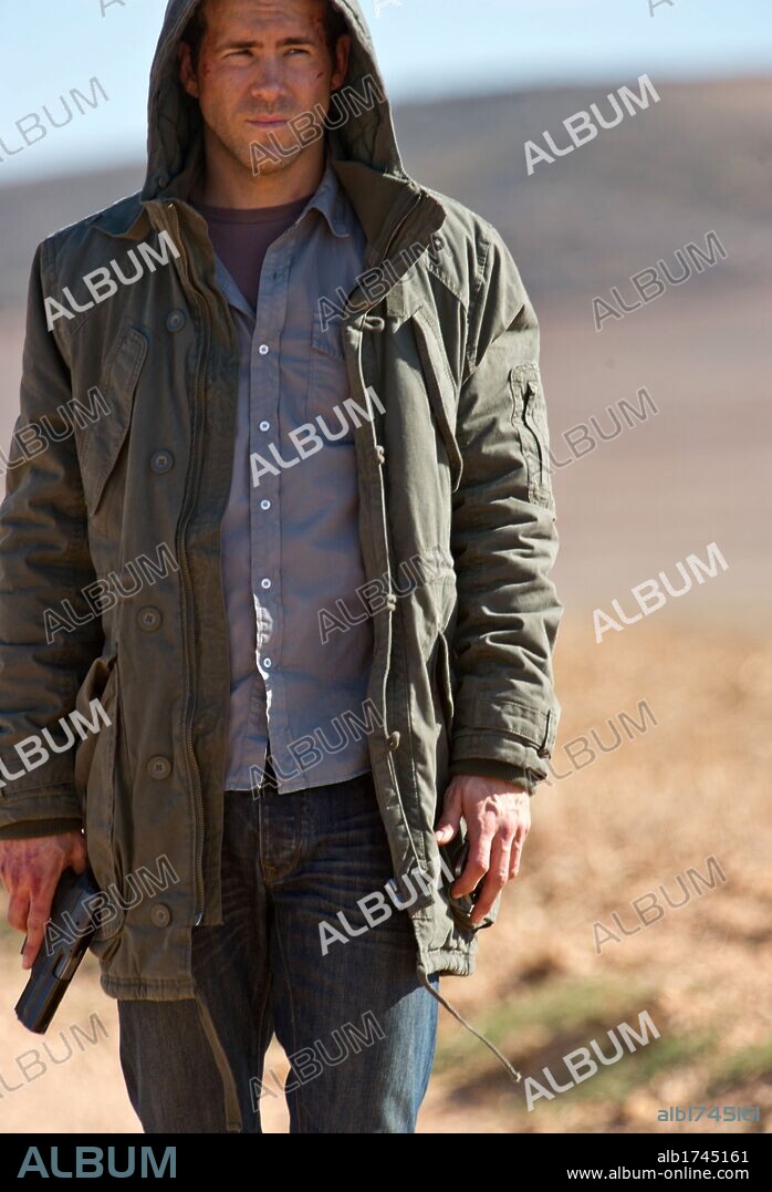 RYAN REYNOLDS en EL INVITADO, 2012 (SAFE HOUSE), dirigida por DANIEL ESPINOSA. Copyright INTREPID PICTURES.