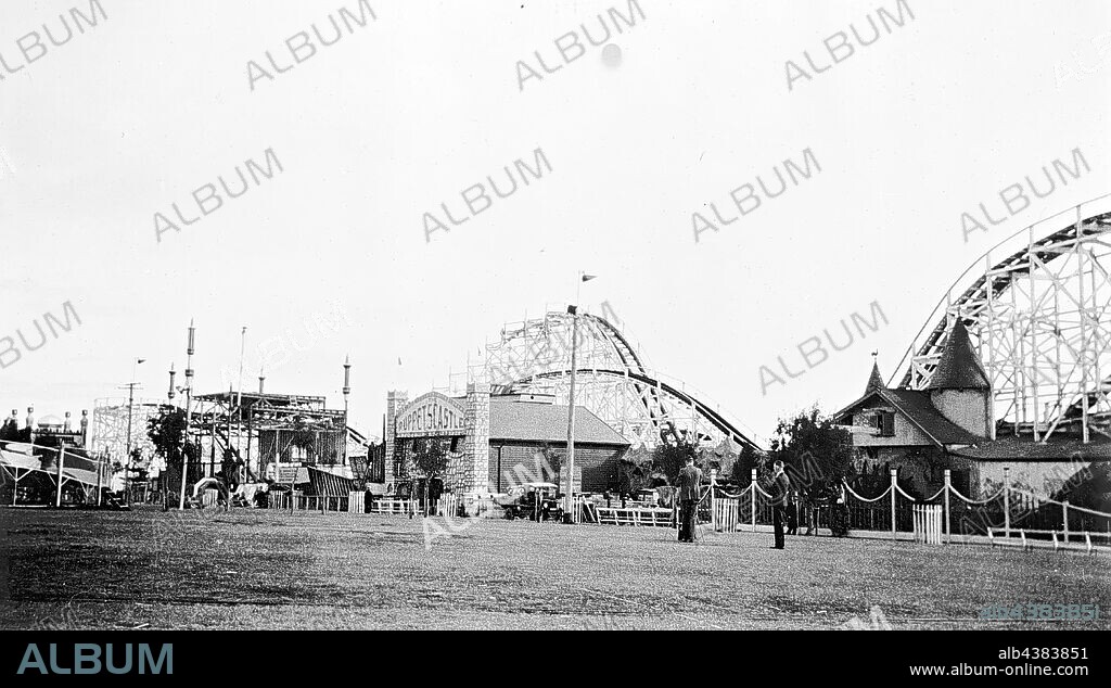 Negative - Luna Park, Glenelg, South Australia, 1935, The fairground at Luna Park. The Big Dipper is in the background which was later dismantled and taken to Sydney.