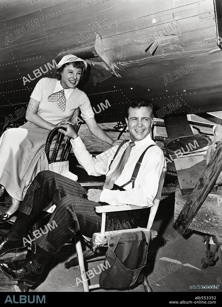 DICK POWELL and JUNE ALLYSON in THE REFORMER AND THE REDHEAD, 1950, directed by MELVIN FRANK and NORMAN PANAMA. Copyright METRO GOLDWYN MAYER.