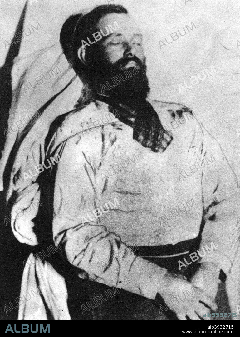 Jesse James in death, 1882 (1954). Picture taken just before he was placed in his $500 coffin. A leading member of the James-Younger gang, Jesse James was one of the most notorious outlaws of the American West, robbing banks, stagecoaches and trains. He was shot and killed in 1882 by Robert Ford, a member of the gang intent on claiming the bounty on James's head. A print from the Pictorial History of the Wild West, by James D Horan and Paul Sann, Spring Books, London, 1954.