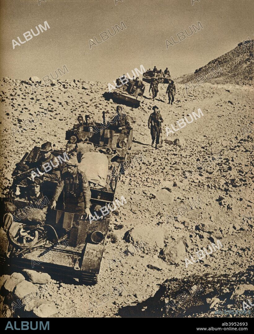 'With Anderson's Men in Tunisia', 1943. The Tunisia Campaign (also known as the Battle of Tunisia) was a series of battles that took place in Tunisia during the North African Campaign of the Second World War. Lieutenant-General Kenneth Anderson, commanding British First Army, was in overall command. From The War Illustrated Volume 6 edited by Sir John Hammerton. [The Amalgamated Press Ltd, London, 1943].