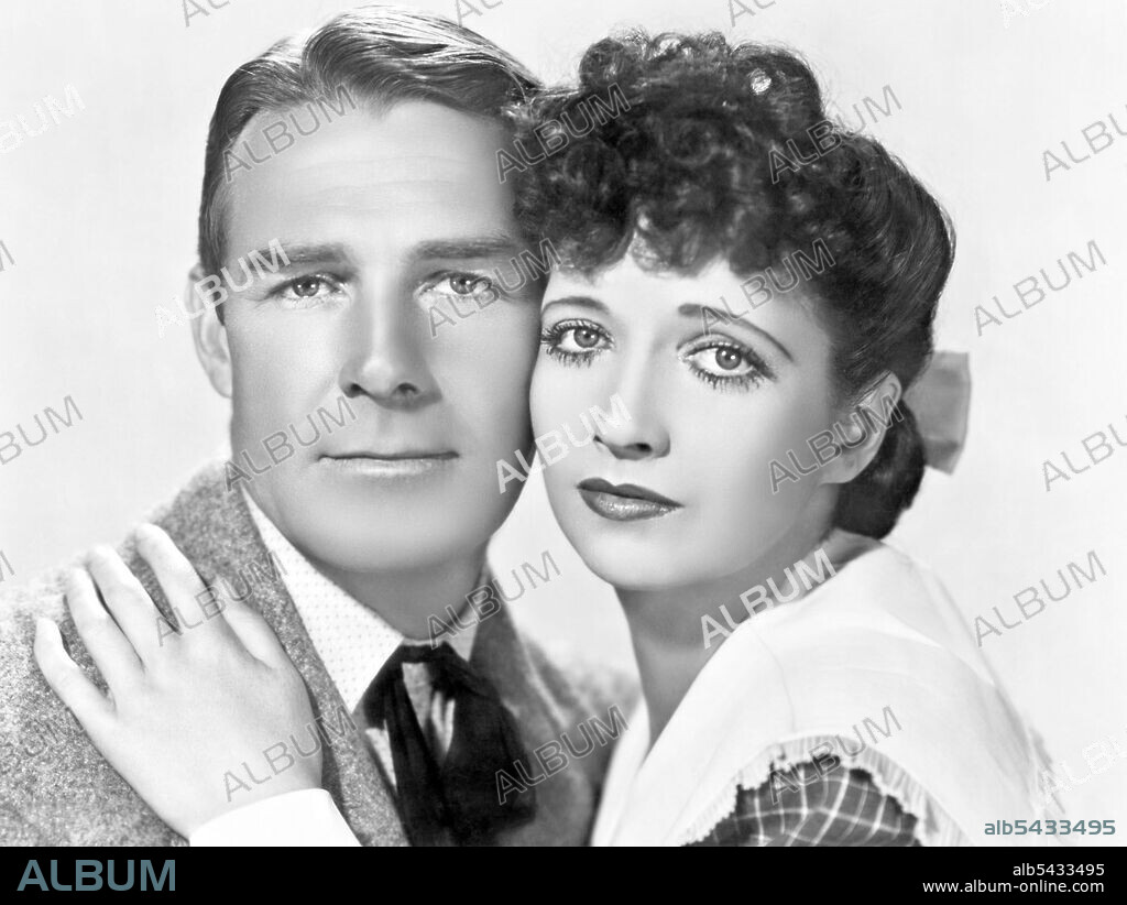 KAY FRANCIS and RANDOLPH SCOTT in WHEN THE DALTONS RODE, 1940, directed by ALAN MARSHALL. Copyright UNIVERSAL PICTURES.