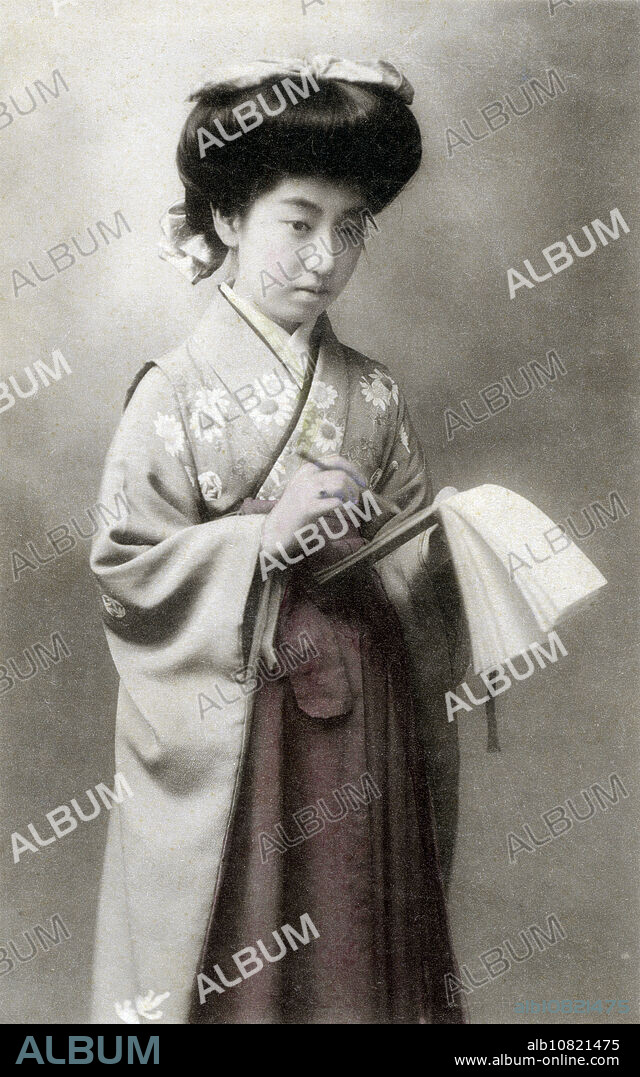 [ 1910s Japan - Japanese Geisha ] The famed geisha Teruha () wearing a hakama and holding a notebook. Born in Nara in 1896 (Meiji 29) as Tatsuko Takaoka (), her father sold her to a geisha house when she was 12. In 1935 (Showa 10), Teruha entered Gio-Ji Temple in Arashiyama as a Buddhist nun. She died in in 1995 (Heisei 7) at the age of 99. 20th century vintage postcard.