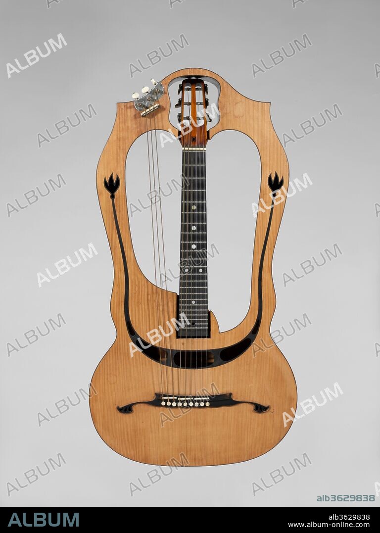 Harp Guitar. Culture: Italian. Dimensions: 33 × 17 1/2 × 2 5/8 in. (83.8 × 44.4 × 6.7 cm). Maker: Luigi Mozzani (Italian, Faenza 1869-1943 Rovereto). Date: ca. 1915.
This unusual looking instrument was named by its maker the chitarra lyra a due bracci (double-armed lyre-guitar). It was based on the design of guitars built in the 1840s by Friedrich Schenk of Vienna. The unusual "arms" (so-called by Mozzani) join at the top around the headstock.  The entire body, including the arms, are hollow.The neck is free from the body and held in place by six metal bolts (three at the heel and three at the headstock). The bolts can be reached, and adjusted, through holes in the back of the instrument. This mechanism was patented by Mozzani in 1912.