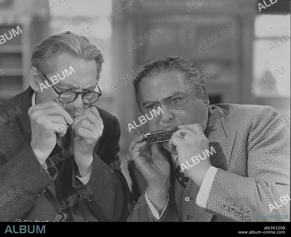 EDWARD ARNOLD and LIONEL BARRYMORE in YOU CAN'T TAKE IT WITH YOU, 1938, directed by FRANK CAPRA. Copyright COLUMBIA PICTURES.