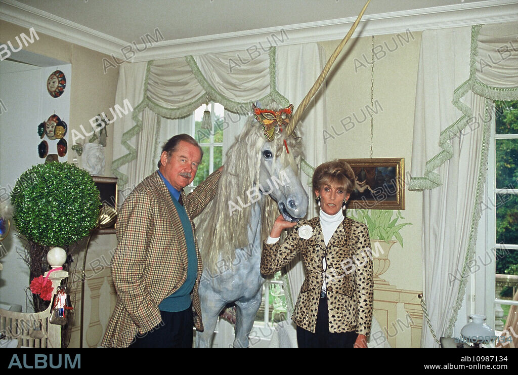 Prince Ferdinand von Bismarck poses with his wife Elisabeth (Lippens) next to a unicorn in the family residence of Bismarck's Schloss Friedrichsruh near Hamburg, Germany 2006.