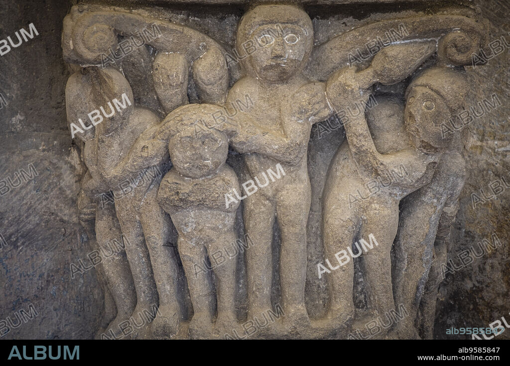 grabbing the hair in a possible fight, the girl with the braids roman capital, San Martín de Elines, Valderredible region, Cantabria, Spain.