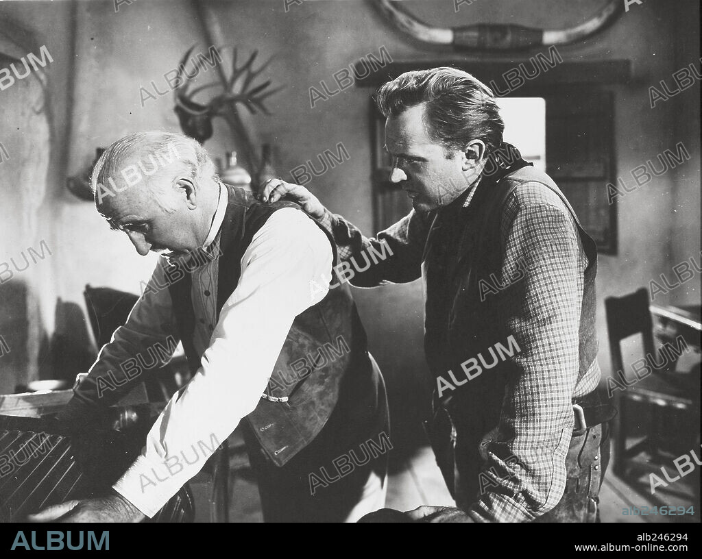 ARTHUR KENNEDY and DONALD CRISP in THE MAN FROM LARAMIE, 1955, directed by ANTHONY MANN. Copyright COLUMBIA PICTURES.
