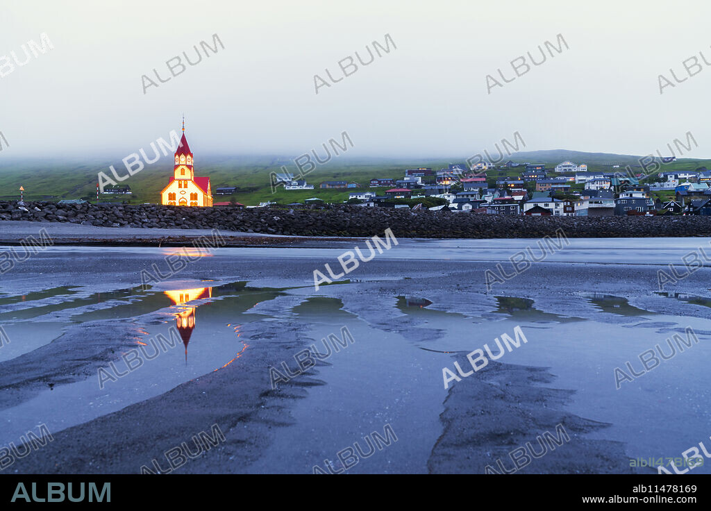 Church of Sandavagur at dusk, Vagar island, Faroe Islands, Denmark, Europe.