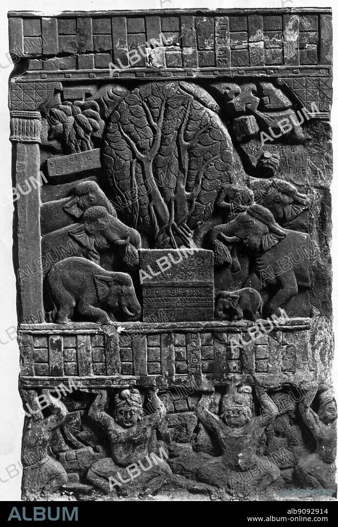 Bharhut . Elephants paying homage to the Buddha from Bharhut. Represented by the Bo Tree. The stupa of Bharhut is between Allahabad and Jabalpur situated in the erstwhile Nagod state of Madhya Pradesh. It was probably built around 150 B.C. The site was discovered by sir Alexander Cunningham in 1873. there are hardly any remains at the site now. Some of the remains of this stupa are kept in the Indian Museum in Calcutta. The railings of the stupa are carved. These posts, railing, capping stones and gateways, all fashioned in deep red sandstone, once surrounded a stupa. The remarkable precision of the carvings and liveliness of the figures, narrative scenes and decorative themes testify to the vitality of India's early artistic traditions. Many of the Bharhut posts are carved with yakshis which protrude in past relief; they stand in attitudes of devotion upon ganas or clutch branches of the tree. Here too are royal devotees, riders on horses and elephants, and even one example of a figure in foreign dress.