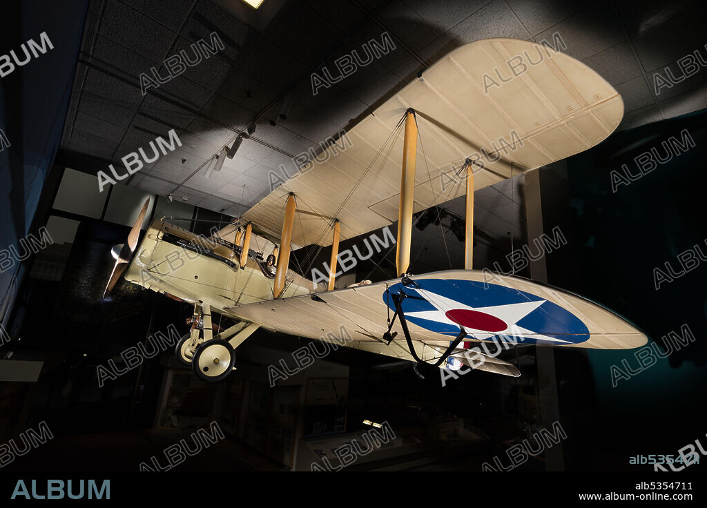 DAYTON-WRIGHT COMPANY. Two-seat, single-engine World War I biplane observation and bomber aircraft; 400-horsepower Liberty V-12 water-cooled engine. American-built version of a British design. Wings and tail natural finish overall. Fuselage light yellow on sides, brown on top. The United States possessed no combat-worthy aircraft upon entry into World War I in 1917. Several European aircraft were considered. The British DH-4 was selected because of its comparatively simple construction and its apparent adaptability to mass production. It was also well-suited to the new American 400-horsepower Liberty V-12 engine. American-built DH-4s were dubbed the "Liberty Plane." By war's end, 13 Army Air Service squadrons, five of them bomber squadrons, were equipped with them. In addition, four combined Navy-Marine squadrons were flying DH-4s along the Belgian coast.
