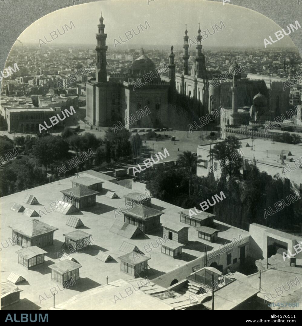 'Cairo, the City of Romance, N.W., from Saladin's Citadel, Egypt', c1930s. View of the Mosque-Madrassa of Sultan Hassan built between 1356-1363 by Sultan an-Nasir Hasan from the citadel built by Salah ad-Din From "Tour of the World". [Keystone View Company, Meadville, Pa., New York, Chicago, London].