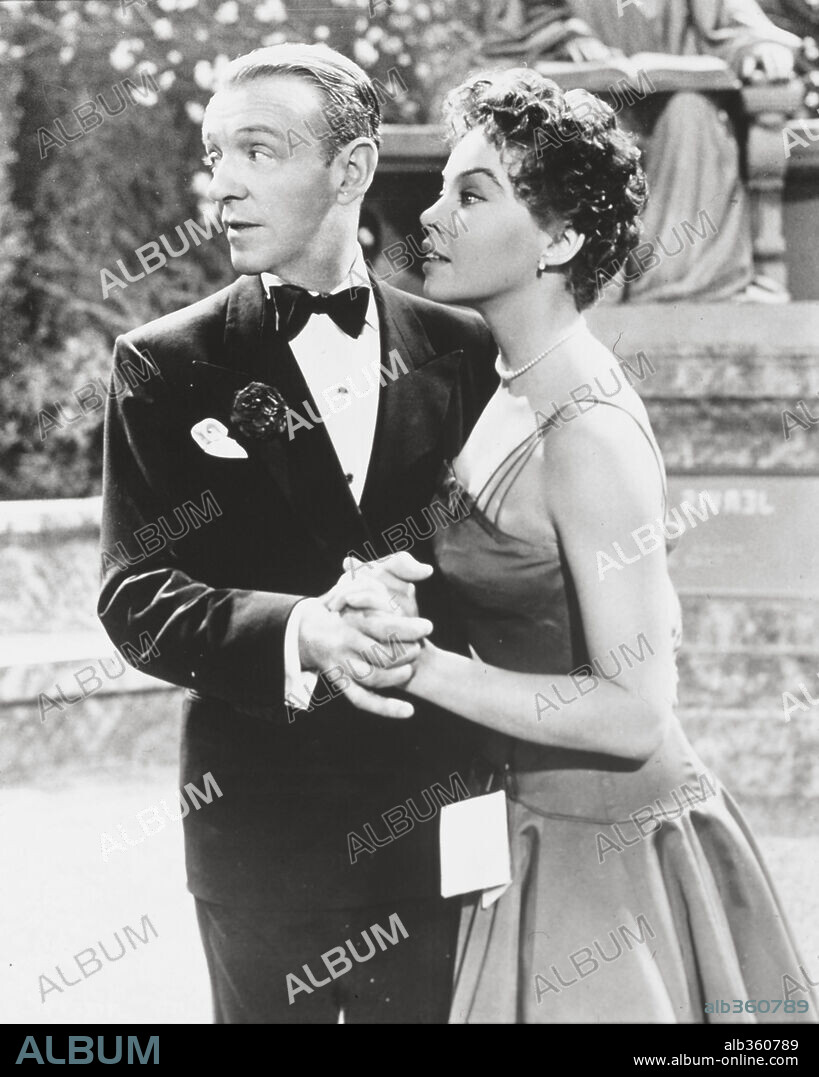 FRED ASTAIRE and LESLIE CARON in DADDY LONG LEGS, 1955, directed by JEAN NEGULESCO. Copyright 20TH CENTURY FOX.