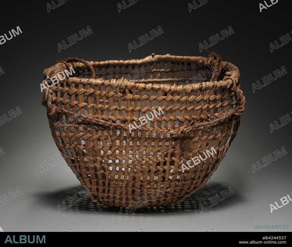 Clam basket with Tump Line, late 1800. Northwest Coast, Clallam, late 19th century. Cedar root; openwork, braided, plaited; overall: 32.5 x 42.5 cm (12 13/16 x 16 3/4 in.); cord: 101.6 cm (40 in.).