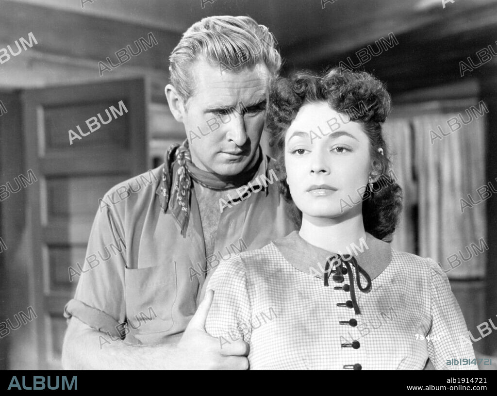 LLOYD BRIDGES and RUTH ROMAN in COLT.45, 1950. Copyright WARNER BROTHERS.