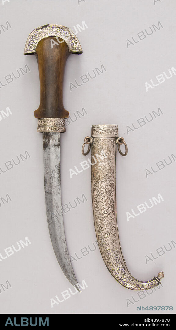 Dagger (Jambiya) and Sheath, Moroccan, 19th century, Moroccan, Steel, wood, silver, horn (rhinoceros), H. with sheath 14 3/4 in. (37.5 cm); H. without sheath 14 3/4 in. (37.5 cm); H. of blade 9 in. (22.9 cm); W. 3 1/4 in. (8.3 cm); Wt. 10.4 oz. (294.8 g); Wt. of sheath 6 oz. (170.1 g), Daggers.