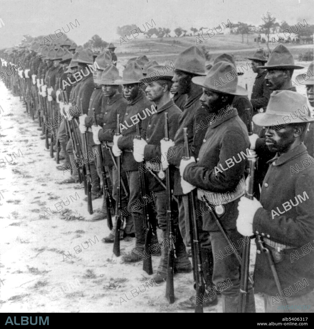 Editorial use only . Formation of Black soldiers, after Spanish-American War. Buffalo Soldiers originally were members of the US 10th Cavalry Regiment of the United States Army. This nickname was given to the Negro Cavalry by the Native American tribes they fought in the Indian Wars. The term eventually became synonymous with all of the African American regiments formed in 1866: 9th Cavalry Regiment, 10th Cavalry Regiment, 24th Infantry Regiment, and 25th Infantry Regiment. Although several African American regiments were raised during the Civil War as part of the Union Army, the Buffalo Soldiers were established by Congress as the first peacetime all-black regiments in the regular US Army. On September 6, 2005, Mark Matthews, who was the last living Buffalo Soldier, died at the age of 111. He was buried at Arlington National Cemetery. Cropped stereograph by Underwood & Underwood, 1899.