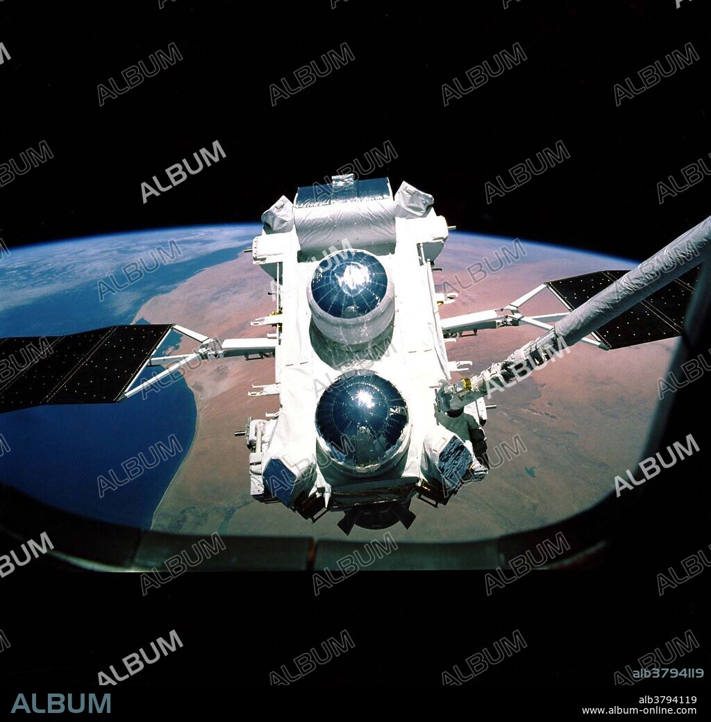 Compton Gamma-Ray Observatory (GRO) being deployed by the Remote Manipulator System (RMS) arm aboard the Space Shuttle Atlantis during STS-37 mission, April 1991. The GRO reentered Earth atmosphere and ended its successful mission in June 2000. For 9 years, the GRO Burst and Transient Source Experiment, designed and built by the Marshall Space Flight Center, kept a watch on the universe to alert scientists to the invisible, mysterious gamma-ray bursts that had puzzled them for decades. By studying gamma-rays from objects like black holes, pulsars, quasars, neutron stars, and other exotic objects, scientists could discover clues to the birth, evolution, and death of stars, galaxies, and the universe. The gamma-ray instrument was one of four major science instruments aboard the Compton. It consisted of eight detectors, or modules, located at each corner of the rectangular satellite to simultaneously scan the entire universe for bursts of gamma-rays ranging in duration from fractions of a second to minutes.