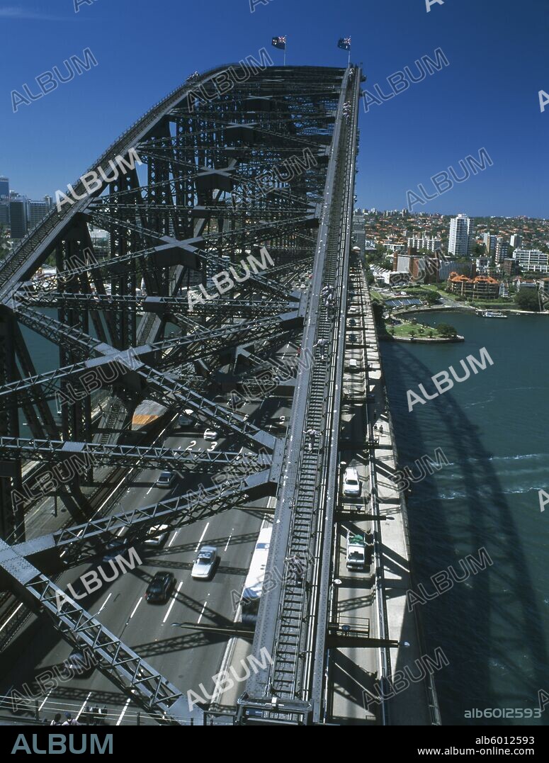 AUSTRALIA New South Wales Sydney Sydney Harbour Bridge seen from Pylon Lookout with people on Bridge Climb below.