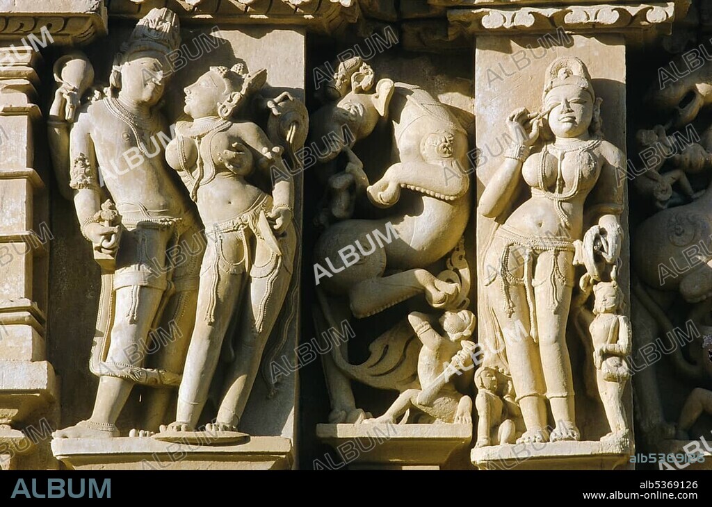 Stone carvings with scenes from Kamasutra, Khajuraho temples, Khajuraho, Madhya Pradesh, India, Asia