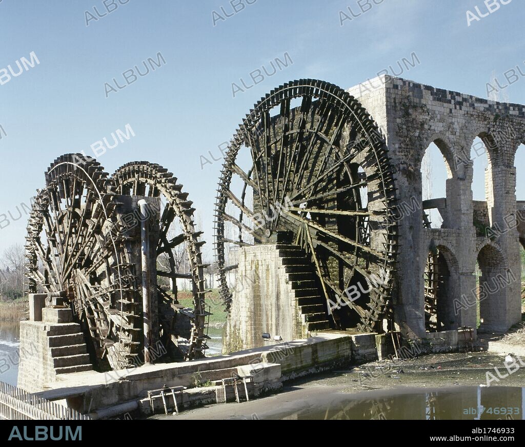 Syrian. The Norias of Bechriyyat in Hama. The waterwheels at Hama, known as Norias, are up to 20m high and have been standing since the 13th century. Middle East.