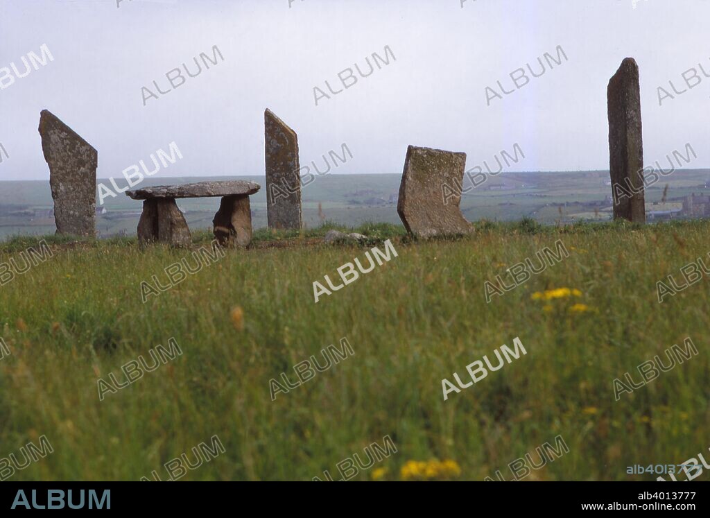 Megalithic Circle and Dolmen, c3rd millennium BC, Stenness, Orkney, Scotland, 20th century. The Standing Stones of Stenness are a neolithic monument five miles northeast of Stromness on the mainland of Orkney. Maybe the oldest henge site in the British Isles associated with traditions and rituals, the  Dolmen is a19th century reconstruction.