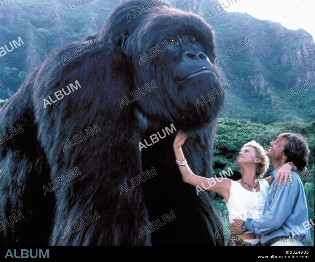 BILL PAXTON y CHARLIZE THERON en MI GRAN AMIGO JOE, 1998 (MIGHTY JOE YOUNG), dirigida por RON UNDERWOOD. Copyright WALT DISNEY PICTURES / BATZDORFF, RON.
