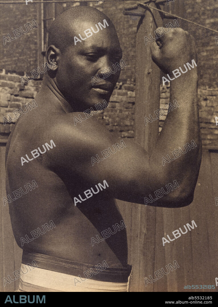 Jack Johnson (1878-1946), American Boxer, became first Black American World Heavyweight Boxing Champion, half-length Portrait, Paul Thompson, 1910.