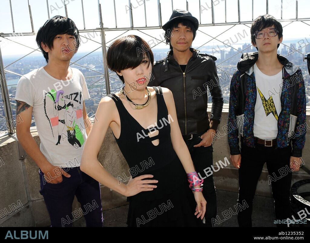 Sep 25, 2009 - Manhattan, New York, USA - Chinese indie rock band QUEEN SEA BIG SHARK, members: XIAO WU, FU HAN, CAO PU and WANG JINGHAN on the observation deck of Empire State Building. 25/09/2009