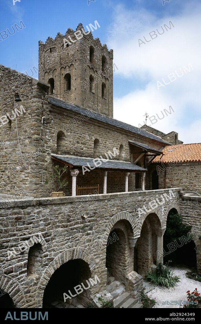 France. Pyrenees-Orientales. Languedoc-Roussillon region. Abbey of Saint-Martin-du-Canigou. Monastery built in 1009, on Canigou mountain. It was built from 1005-1009 by Guifred, Count of Cerdanya in Romanesque style. Partial view of the monastic complex. Restoration of 1900-1920.