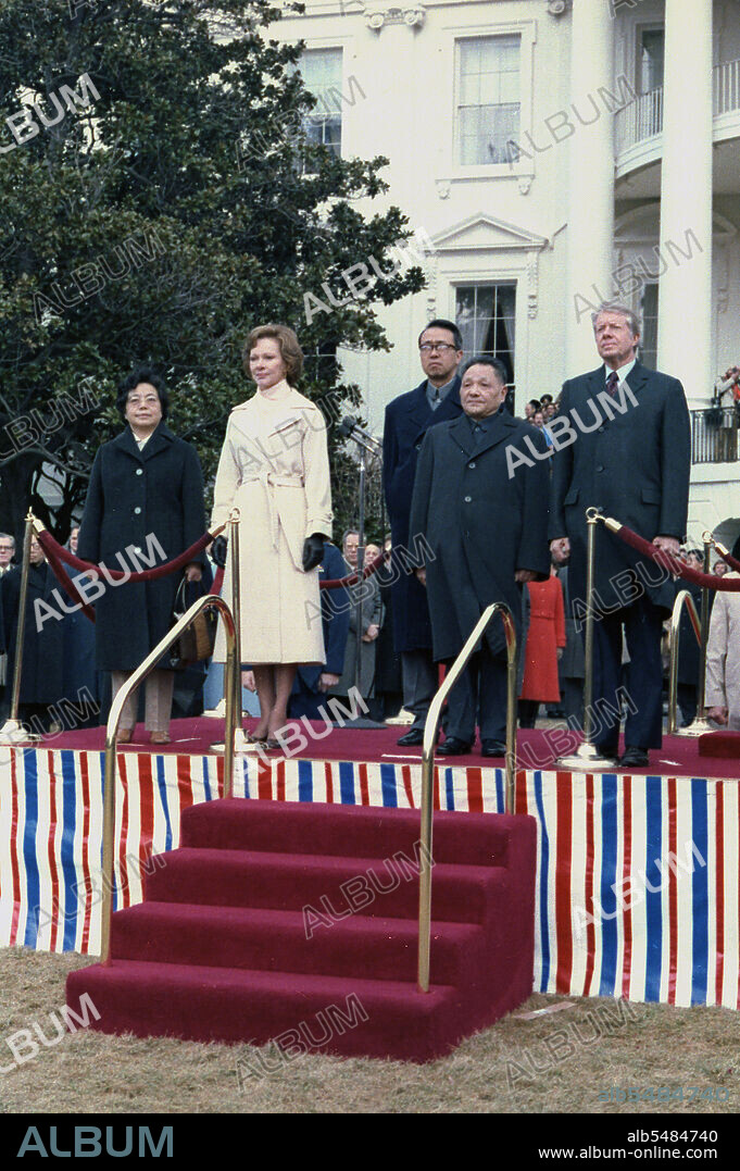 Madame Zhuo Lin, Rosalynn Carter, Deng Xiaoping and Jimmy Carter at the arrival ceremony for the Vice Premier of China. circa  29 January 1979.