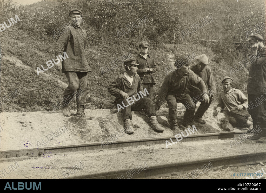 Obluchye station - Local residents near the expedition carriage, 1929. In the early part of the Stalin era, the Kremlin established a new administrative territory in the Soviet Far East--the Jewish Autonomous Region--to serve as a Jewish homeland. The capital of the region was the city of Birobidzhan. This album includes 274 photographs of the early years of Birobidzhan, beginning in the late 1920s. National Library of Russia.