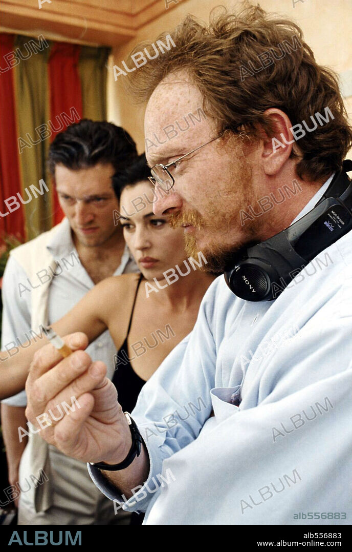 FREDERIC SCHOENDOERFFER, MONICA BELLUCCI and VINCENT CASSEL in SECRET AGENTS, 2004 (AGENTS SECRETS), directed by FREDERIC SCHOENDOERFFER. Copyright LA CHAUVE SOURIS.