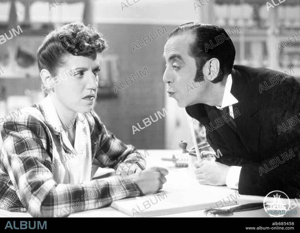 FERNANDO FREYRE DE ANDRADE and MARY SANTPERE in ANGELA ES ASI, 1945, directed by RAMON QUADRENY. Copyright CAMPA.