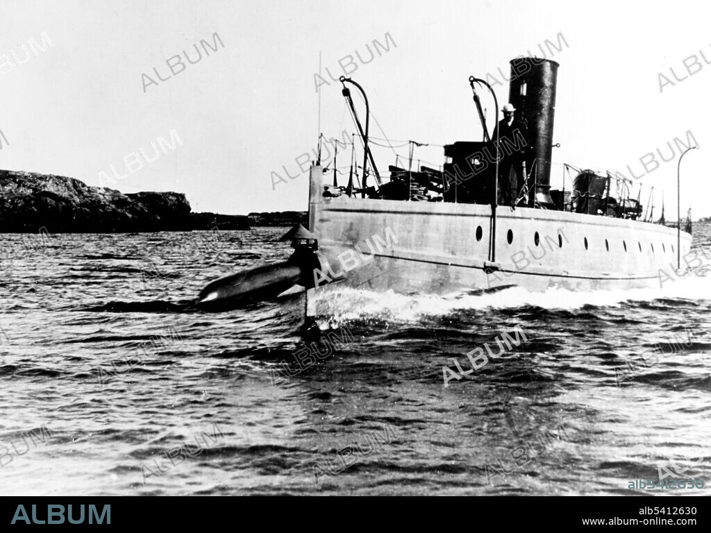 USS Stiletto firing a torpedo from her bow tube, about 1890. A torpedo is an underwater ranged weapon launched above or below the water surface, self-propelled towards a target, and with an explosive warhead designed to detonate either on contact with or in proximity to the target. There are two main types of torpedo tube: underwater tubes fitted to submarines and some surface ships, and deck-mounted units (torpedo launchers) installed aboard surface vessels. (cropped and cleaned).