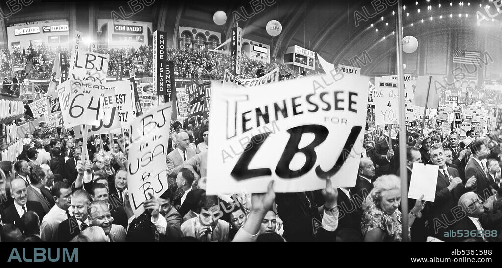 Delegates with LBJ signs on floor of Democratic National Convention, Boardwalk Hall, Atlantic City, New Jersey, USA, Warren K. Leffler, August 26, 1964.
