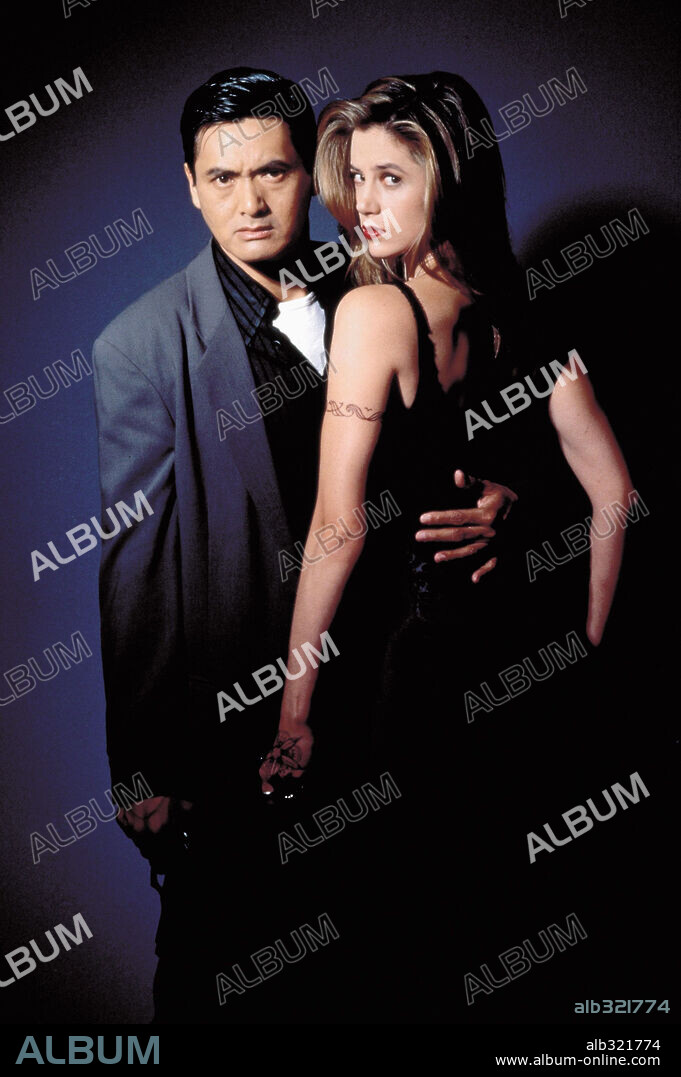 CHOW YUN-FAT and MIRA SORVINO in THE REPLACEMENT KILLERS, 1998, directed by ANTOINE FUQUA. Copyright COLUMBIA PICTURES / MASI, FRANK.