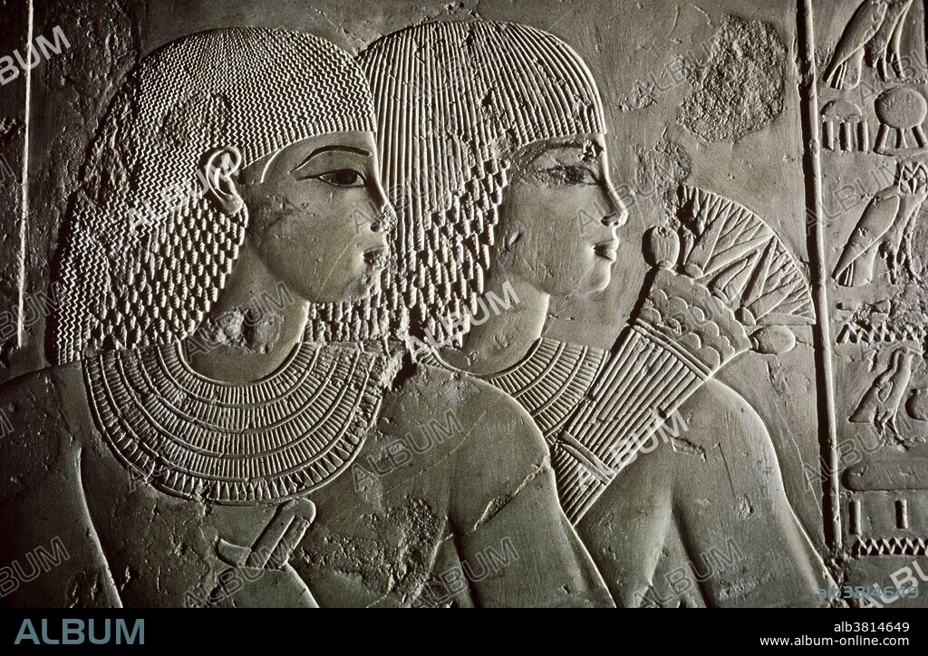 A bas-relief depicting the family of Ramose (c. 1411-1375 BCE), who was governor or vizier (highest official) of Thebes during the early reign of Amenhotep III. This is a detail from a banquet scene. Tomb of Ramose, Valley of the Nobles, Egypt.