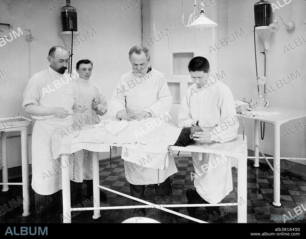 Pavlov with three colleagues operating on a dog in the Physiology Department, Imperial Institute of Experimental Medicine, St Petersburg, 1902. Ivan Petrovich Pavlov (1849-1936) was a Russian physiologist and experimental psychologist, who received the 1904 Nobel Prize for his work on the physiology of the digestive glands. He is best remembered for his work on conditioned reflexes, in which he conditioned dogs to salivate in anticipation of food by ringing a bell each meal time. Eventually, the bell alone provoked salivation. These experiments became the foundation of behaviorist psychology.