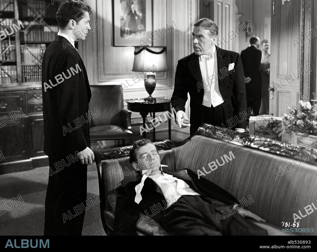 FARLEY GRANGER, LEO G. CARROLL and ROBERT WALKER in STRANGERS ON A TRAIN, 1951, directed by ALFRED HITCHCOCK. Copyright WARNER BROTHERS.