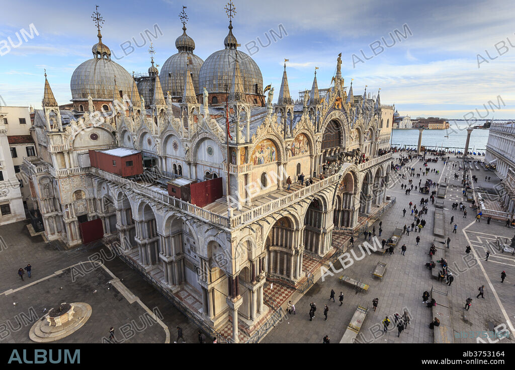 Basilica San Marco, elevated view from Torre dell'Orologio, late afternoon sun in winter, Venice, UNESCO World Heritage Site, Veneto, Italy, Europe.