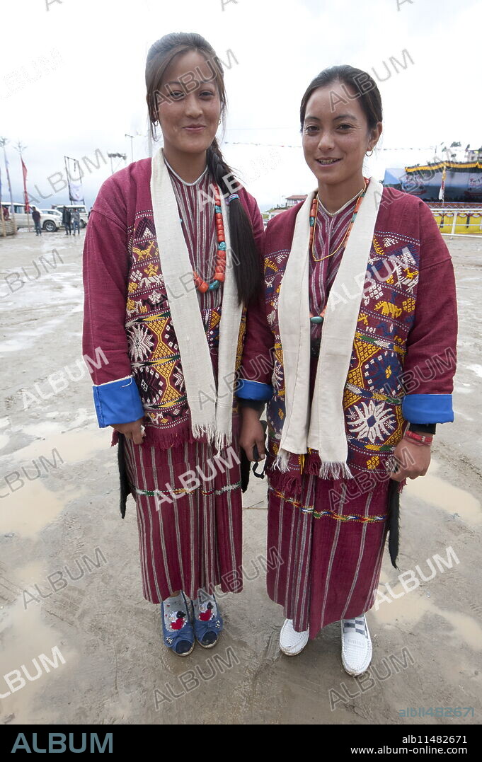 Sisters wearing Momba tribal dress, Tawang, Arunachal Pradesh, India, Asia.