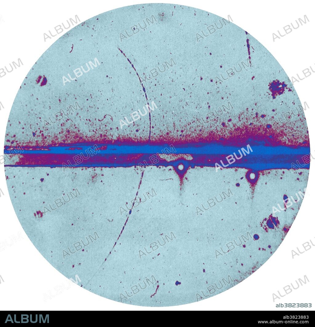 First evidence existence of positron single track antiparticle of electron from California Institute of Technology; Cloud Chamber; adduced by C.D. Anderson's photo, 1932. Carl David Anderson (September 3, 1905 - January 11, 1991) was an American physicist. Under the supervision of Robert Millikan, he began investigations into cosmic rays during the course of which he encountered unexpected particle tracks in his cloud chamber photographs that he correctly interpreted as having been created by a particle with the same mass as the electron, but with opposite electrical charge. This discovery, announced in 1932 and later confirmed by others, validated Paul Dirac's theoretical prediction of the existence of the positron. For this work, Anderson shared the 1936 Nobel Prize in Physics with Victor Hess. Also in 1936, Anderson and his first graduate student, Seth Neddermeyer, discovered the muon (mu-meson), a subatomic particle 207 times more massive than the electron, but with the same negative electric charge and spin 1/2 as the electron, again in cosmic rays. He spent all of his academic and research career at Caltech. He died in 1991 at the age of 85.